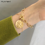 HUANZHI 2019 New Korean Simple Gold Metal Plated Human Head Coin Pearl Portrait Leaf Bracelets for Women Girl Bangle Party Gift